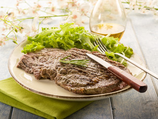 grilled t-bone with green salad