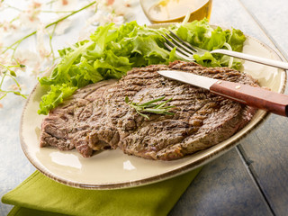 grilled t-bone with green salad