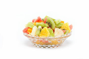 Fresh fruits salad on white background