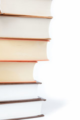 A stack of books on a white background.