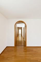 classic house, interior,arched door, long corridor