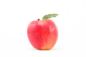 Healthy food. Fresh red apple with green leaf on a white backgro