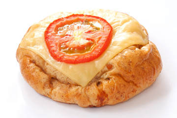 Hamburger with cheese and tomato topping