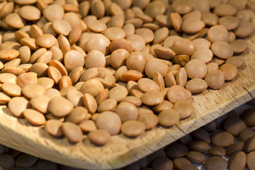Lentil on a wooden spoon