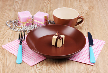 Table setting on wooden background