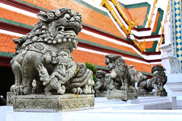 Traditional Thai style lion statue in Wat Phra Kaew