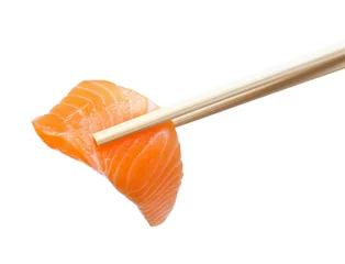 Fotobehang Chopsticks with sliced raw salmon © smokedsalmon