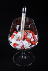 pills and thermometer