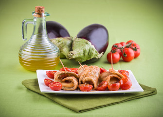 Eggplant roulades with cherry tomato salad.