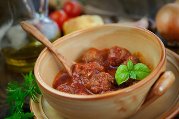 Italian cooking  - meat balls with basil