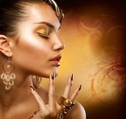 Gold Makeup. Fashion Girl Portrait