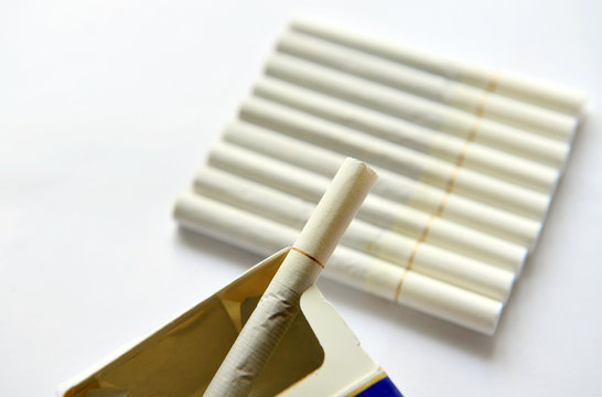 a pack of smoking cigarettes isolated on the white background.