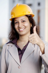 Indian female Industrial engineer showing thumbs up