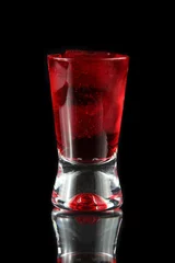 Foto auf Acrylglas red shot on black bacground © promesaartstudio