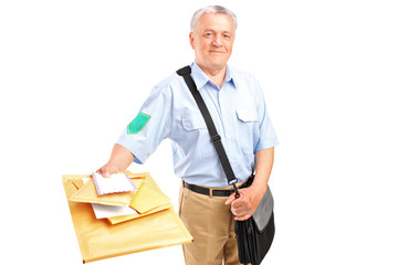 A smiling postman delivering letters