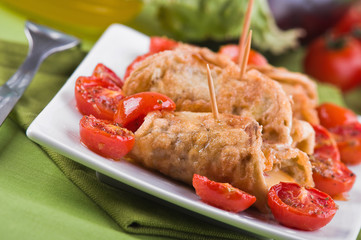 Eggplant roulades with cherry tomato salad.