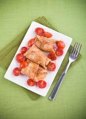 Eggplant roulades with cherry tomato salad.