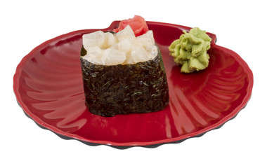 spice sushi hotate with sauced slices of scallop isolated on whi