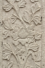 Stone carvings of flowers