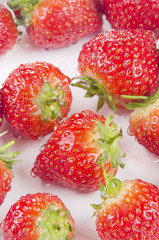 Strawberries are cleaned prior to processing