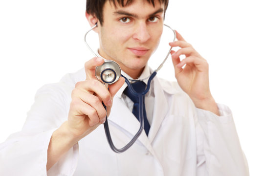 A doctor with a stethoscope, close-up, isolated on white