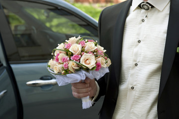 Wedding Bouquet in a Groom's Hand