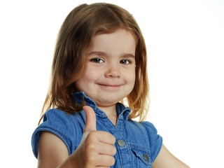 Cute little girl  shows  thumb up on white background