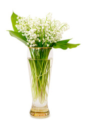 bouquet of lilies of the valley in glass vase