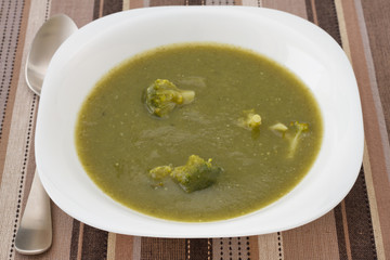 broccoli soup in the white plate