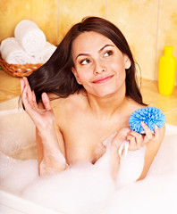 Woman take bubble  bath.
