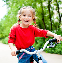 Obraz premium girl with bicycle