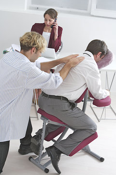Massage "Amma assis" en entreprise