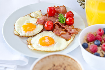 Breakfast setting with fried eggs