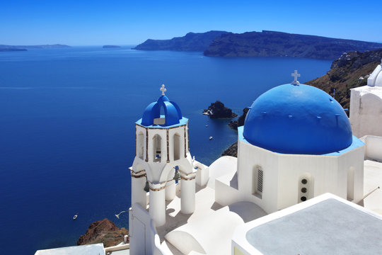 Fototapeta Santorini with Traditional Church in Oia, Greece