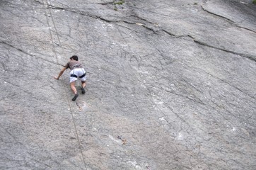 Climber climbing near Valle di Sarca / Arco (Italy)