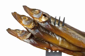 The smoked capelin on a fork