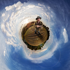 man with smartphone looking up to the sky © Ingo Bartussek