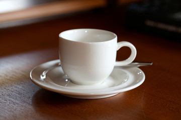 decorate white cup on wood table