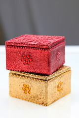 One red and golden gift boxes