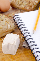 pumpkin seed roll and a booklet for notes