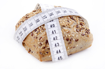 multigrain roll with measuring tape