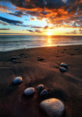 Galets de rivière formant des plages de sable noir, La Réunion.