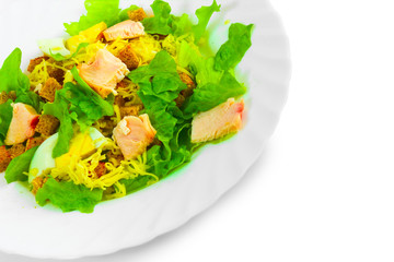 salad appetizer with cheese, ham and egg fried bread and greens