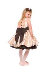 Naklejka premium Lovely little lady in a dress. Isolated