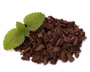 Crushed chocolate shavings pile and mint leaf