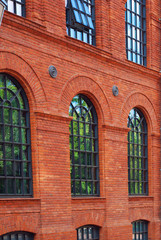 windows of old building in restored shopping centre-Manufactura