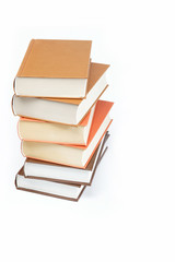 A stack of books on a white background.