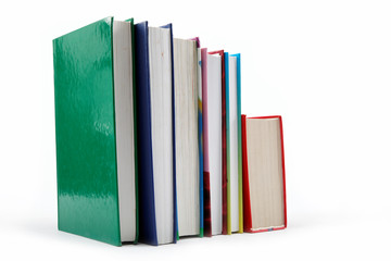 A stack of books on a white background.