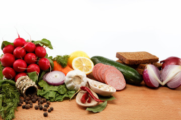 Healthy food. Fresh vegetables and fruits on a wooden table.