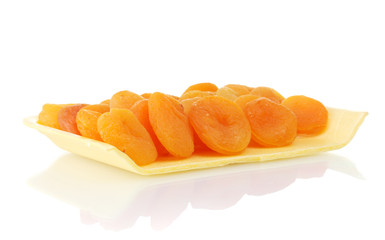 delicious dried apricots in packaging isolated on white
